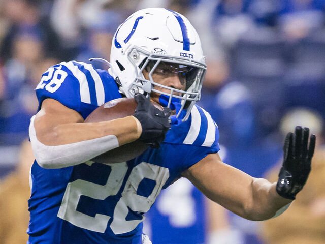INDIANAPOLIS, INDIANA - NOVEMBER 26: Jonathan Taylor #28 of the Indianapolis Colts runs the ball during the game against the Tampa Bay Buccaneers at Lucas Oil Stadium on November 26, 2023 in Indianapolis, Indiana.