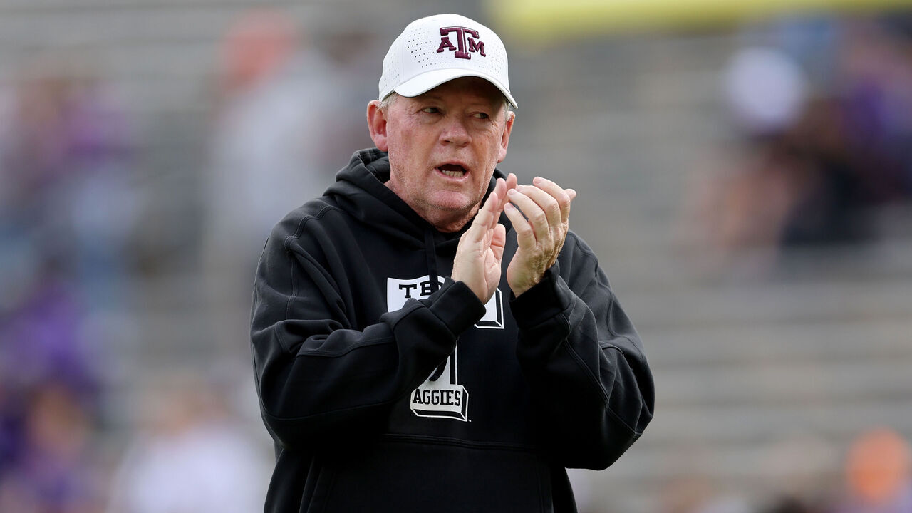 COLLEGE STATION, TEXAS - NOVEMBER 18: Offensive coordinator Bobby Petrino of the Texas A&M Aggies watches players warm up before the game against the Abilene Christian Wildcats at Kyle Field on November 18, 2023 in College Station, Texas.