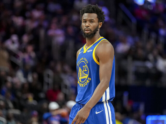 DETROIT, MICHIGAN - NOVEMBER 06: Andrew Wiggins #22 of the Golden State Warriors looks on against the Detroit Pistons at Little Caesars Arena on November 06, 2023 in Detroit, Michigan.