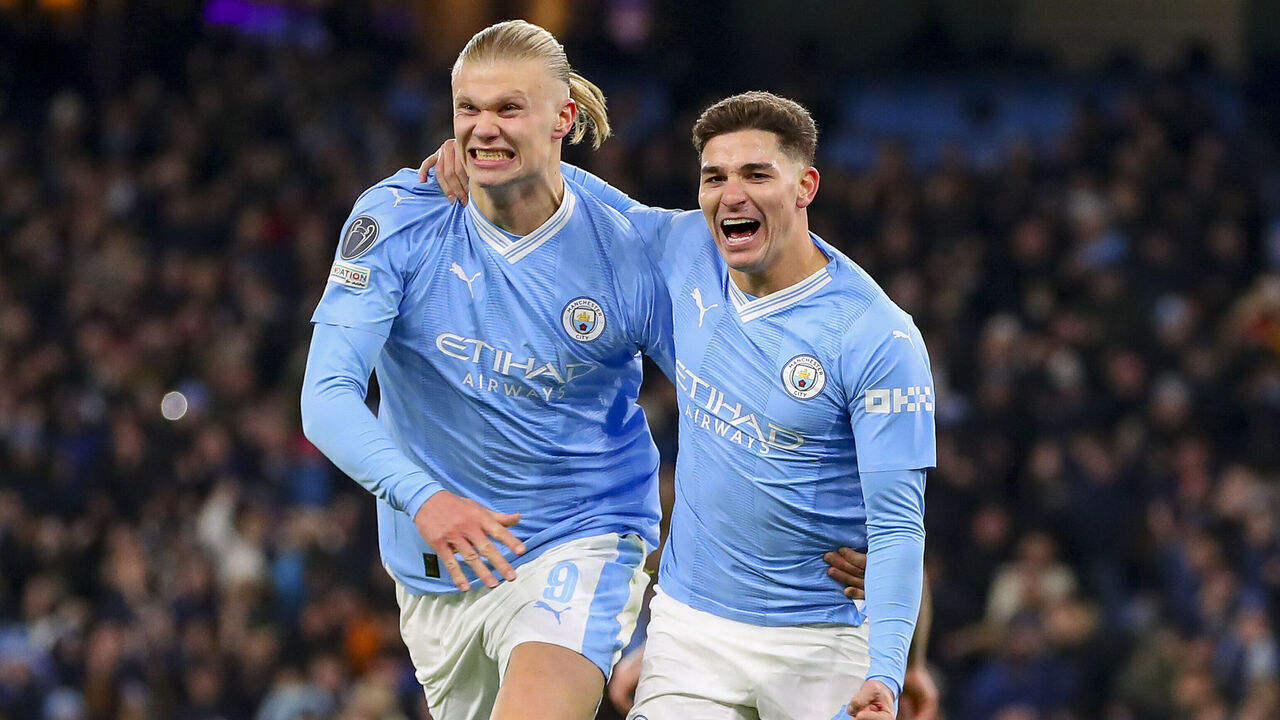 MANCHESTER, ENGLAND - NOVEMBER 28: Julian Alvarez of Manchester City celebrates after scoring his team's third goal with Erling Haaland of Manchester City during the UEFA Champions League match between Manchester City and Rb Leipzig at Etihad Stadium on November 28, 2023 in Manchester, United Kingdom.