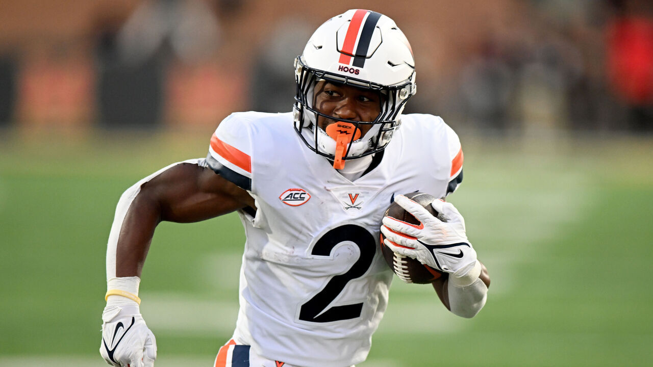 COLLEGE PARK, MARYLAND - SEPTEMBER 15: Perris Jones #2 of the Virginia Cavaliers rushes for a touchdown against the Maryland Terrapins at SECU Stadium on September 15, 2023 in College Park, Maryland.