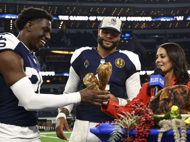 ARLINGTON, TX - NOVEMBER 23: DaRon Bland #26 and Dak Prescott #4 of the Dallas Cowboys do an interview after an NFL football game against the Washington Commanders at AT&T Stadium on November 23, 2023 in Arlington, Texas.