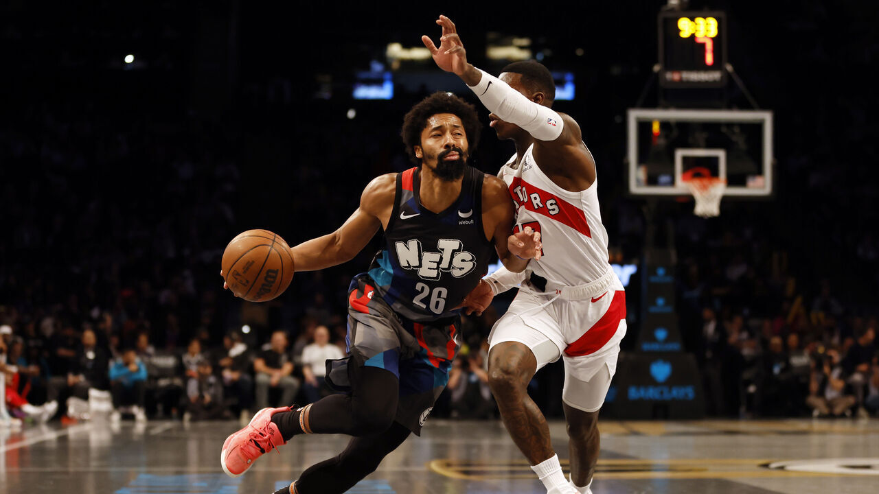 NEW YORK, NEW YORK - NOVEMBER 28: Spencer Dinwiddie #26 of the Brooklyn Nets dribbles against Dennis Schroder #17 of the Toronto Raptors during the second half of an NBA In-Season Tournament game at Barclays Center on November 28, 2023 in the Brooklyn borough of New York City. The Nets won 115-103. NOTE TO USER: User expressly acknowledges and agrees that, by downloading and/or using this photograph, User is consenting to the terms and conditions of the Getty Images License Agreement.