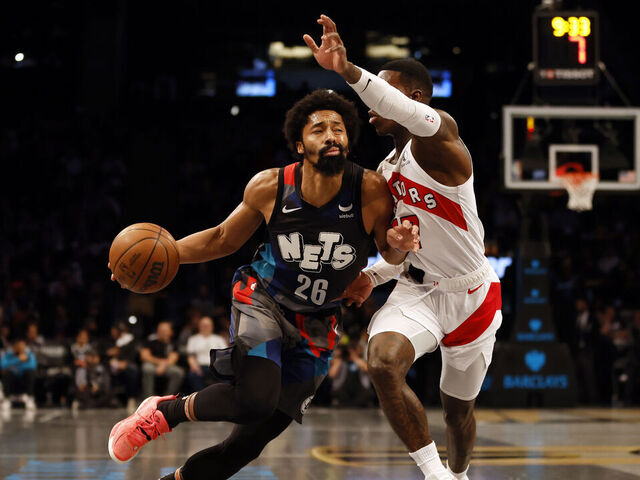 NEW YORK, NEW YORK - NOVEMBER 28: Spencer Dinwiddie #26 of the Brooklyn Nets dribbles against Dennis Schroder #17 of the Toronto Raptors during the second half of an NBA In-Season Tournament game at Barclays Center on November 28, 2023 in the Brooklyn borough of New York City. The Nets won 115-103. NOTE TO USER: User expressly acknowledges and agrees that, by downloading and/or using this photograph, User is consenting to the terms and conditions of the Getty Images License Agreement.