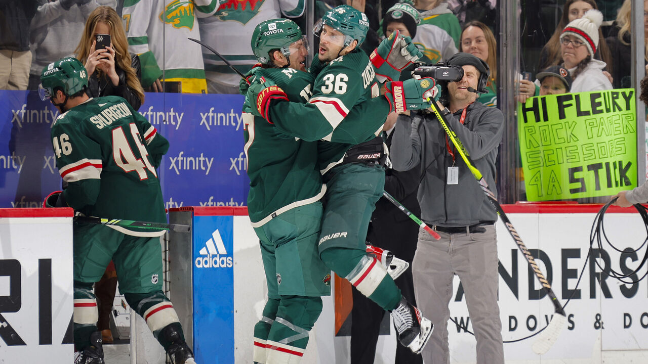 SAINT PAUL, MN - NOVEMBER 28: Marcus Foligno #17 and Mats Zuccarello #36 of the Minnesota Wild celebrate after defeating the St. Louis Blues at the Xcel Energy Center on November 28, 2023 in Saint Paul, Minnesota.