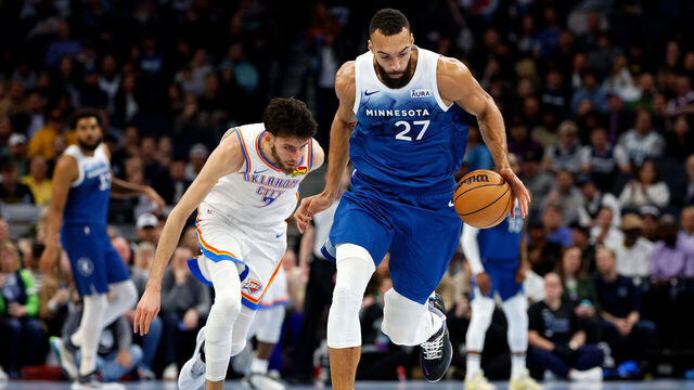 MINNEAPOLIS, MINNESOTA - NOVEMBER 28: Rudy Gobert #27 of the Minnesota Timberwolves steals the ball from Chet Holmgren #7 of the Oklahoma City Thunder in the first quarter during an NBA In-Season Tournament game at Target Center on November 28, 2023 in Minneapolis, Minnesota.