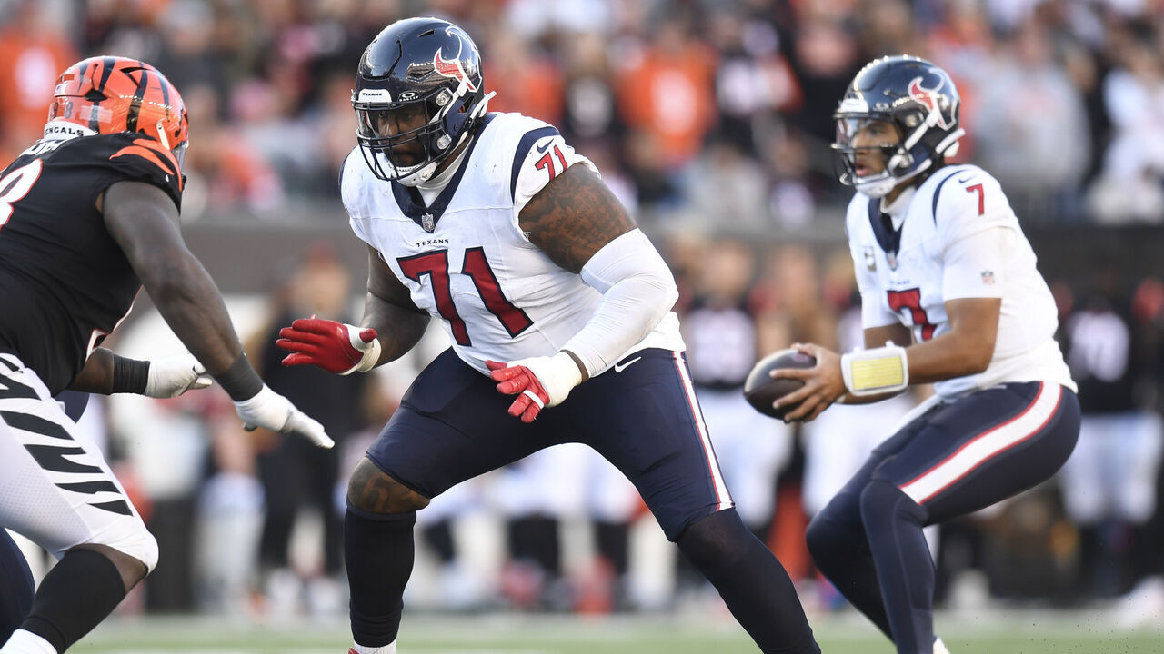 CINCINNATI, OH - NOVEMBER 12: Houston Texans Tackle Tytus Howard (71) blocks as Houston Texans Quarterback C.J. Stroud (7) receives the snap during the NFL football game between the Houston Texans and the Cincinnati Bengals on November 12, 2023, at Paycor Stadium in Cincinnati, Ohio.