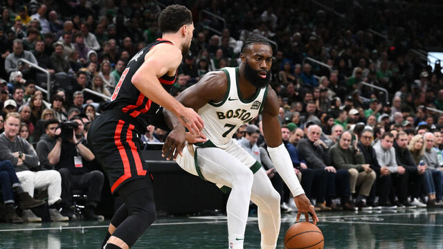 BOSTON, MASSACHUSETTS - NOVEMBER 28: Jaylen Brown #7 of the Boston Celtics drives to the basket against Zach LaVine #8 of the Chicago Bulls during the second quarter of an NBA In-Season Tournament game at the TD Garden on November 28, 2023 in Boston, Massachusetts.