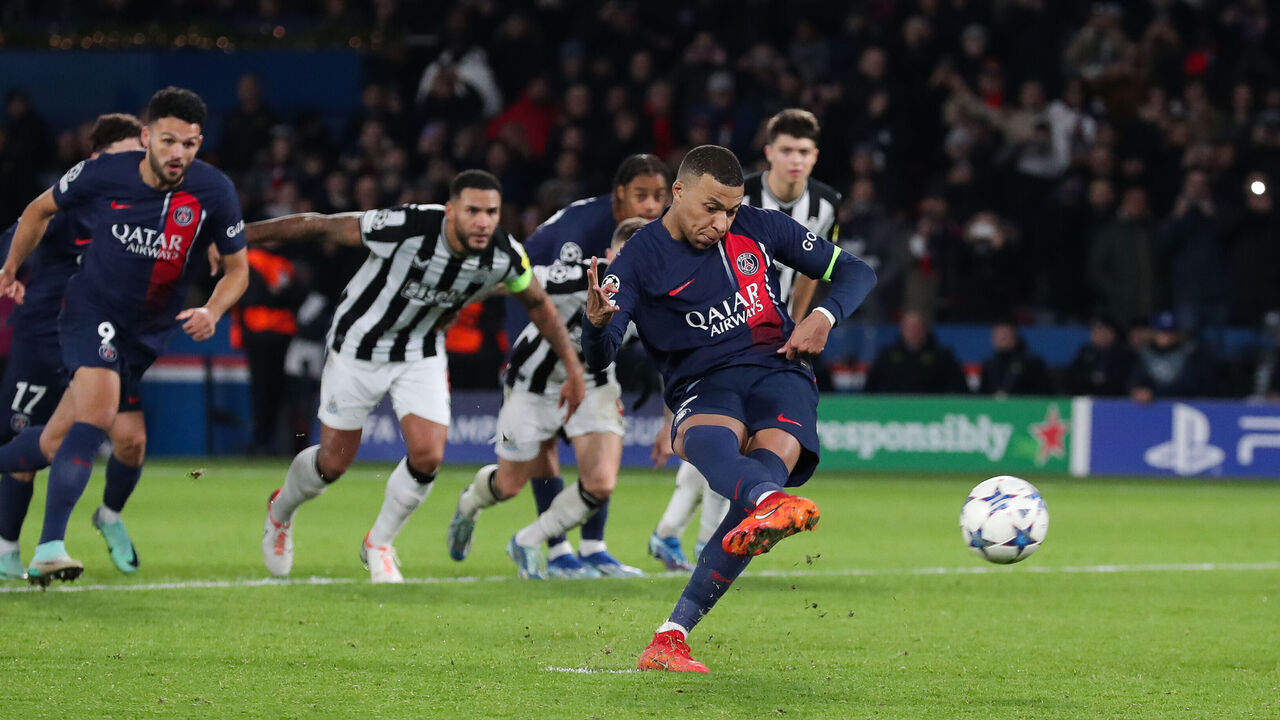 PARIS, FRANCE - NOVEMBER 28: Kylian Mbappe of Paris Saint-Germain scores his side's first goal from the penalty spot in injury time during the UEFA Champions League match between Paris Saint-Germain and Newcastle United FC at Parc des Princes on November 28, 2023 in Paris, France.