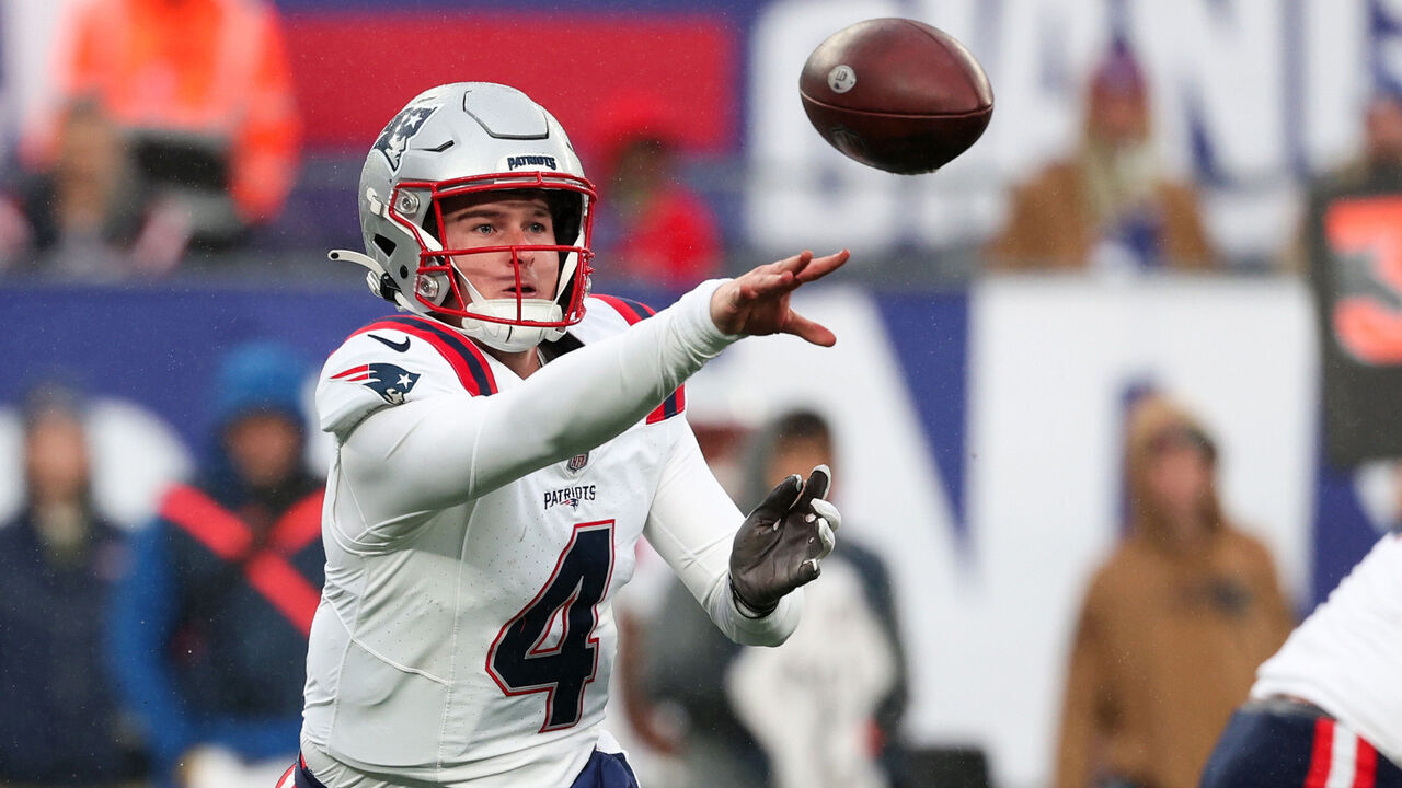 EAST RUTHERFORD, NEW JERSEY - NOVEMBER 26: Bailey Zappe #4 of the New England Patriots throws a pass against the New York Giants during the second half of the game at MetLife Stadium on November 26, 2023 in East Rutherford, New Jersey.