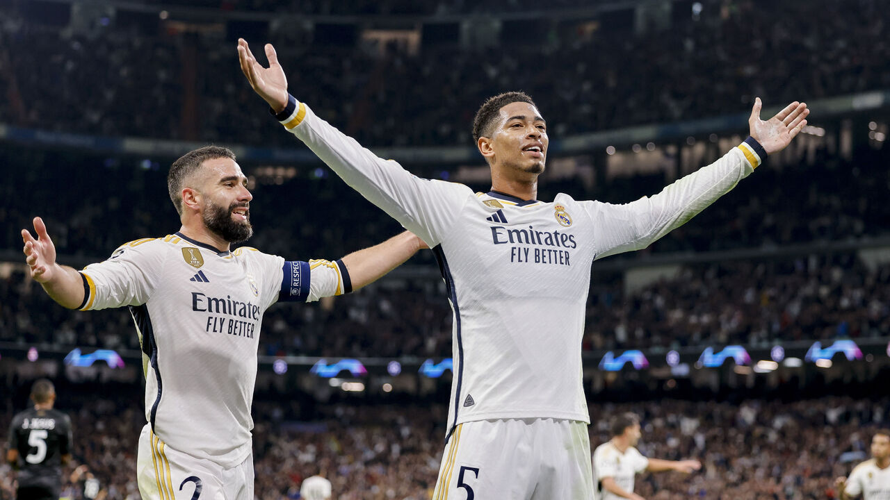 MADRID, SPAIN - NOVEMBER 29: Jude Bellingham of Real Madrid celebrates after scoring his team's second goal during the UEFA Champions League match between Real Madrid and SSC Napoli at Estadio Santiago Bernabeu on November 29, 2023 in Madrid, Spain.
