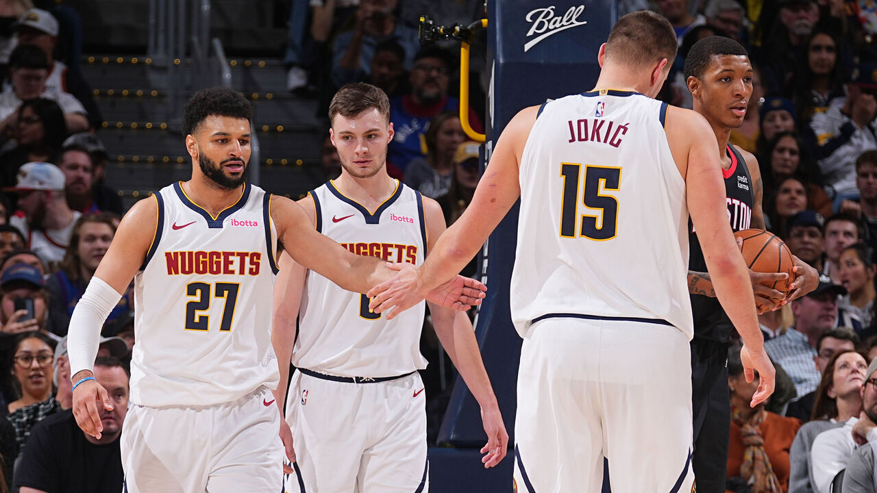 DENVER, CO - NOVEMBER 29: Jamal Murray #27 and Nikola Jokic #15 of the Denver Nuggets high five during the game against the Houston Rockets on November 29, 2023 at the Ball Arena in Denver, Colorado. NOTE TO USER: User expressly acknowledges and agrees that, by downloading and/or using this Photograph, user is consenting to the terms and conditions of the Getty Images License Agreement. Mandatory Copyright Notice: Copyright 2023 NBAE