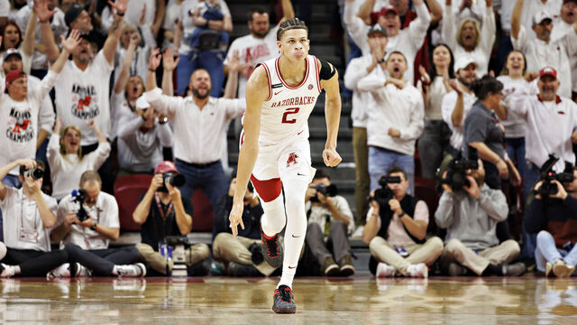 FAYETTEVILLE, ARKANSAS - NOVEMBER 29: Trevon Brazile #2 of the Arkansas Razorbacks reacts after shooting a three pointer in the second half of the game against the Duke Blue Devils at Bud Walton Arena on November 29, 2023 in Fayetteville, Arkansas. The Razorbacks defeated the Blue Devils 80-75.
