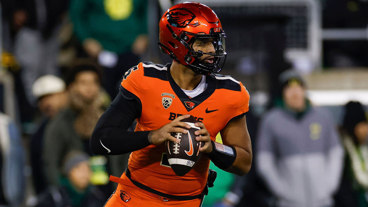 EUGENE, OREGON - NOVEMBER 24: DJ Uiagalelei #5 of the Oregon State Beavers looks for an open receiver in the first half during a game against the Oregon Ducks at Autzen Stadium on November 24, 2023 in Eugene, Oregon.