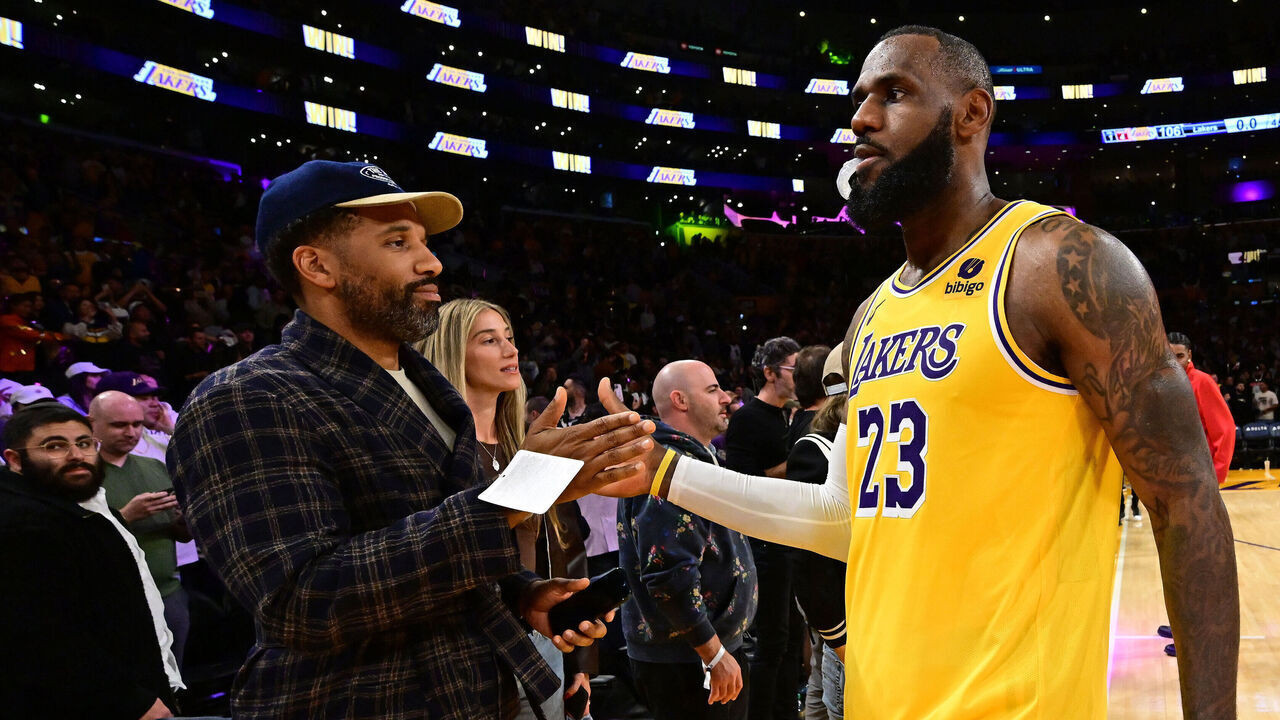 LOS ANGELES, CA - OCTOBER 30: Maverick Carter high fives LeBron James #23 of the Los Angeles Lakers after the game against the Orlando Magic on October 30, 2023 at Crypto.Com Arena in Los Angeles, California. NOTE TO USER: User expressly acknowledges and agrees that, by downloading and/or using this Photograph, user is consenting to the terms and conditions of the Getty Images License Agreement. Mandatory Copyright Notice: Copyright 2023 NBAE