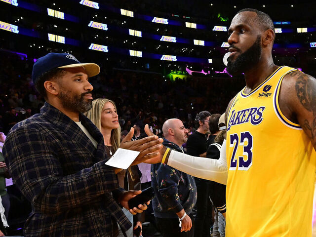 LOS ANGELES, CA - OCTOBER 30: Maverick Carter high fives LeBron James #23 of the Los Angeles Lakers after the game against the Orlando Magic on October 30, 2023 at Crypto.Com Arena in Los Angeles, California. NOTE TO USER: User expressly acknowledges and agrees that, by downloading and/or using this Photograph, user is consenting to the terms and conditions of the Getty Images License Agreement. Mandatory Copyright Notice: Copyright 2023 NBAE