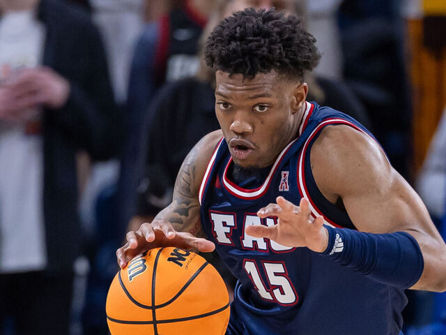 CHICAGO, ILLINOIS - NOVEMBER 8: Alijah Martin #15 of the Florida Atlantic Owls brings the ball up court during the game against the Loyola (Il) Ramblers in the Barstool Invitational at Wintrust Arena on November 8, 2023 in Chicago, Illinois.