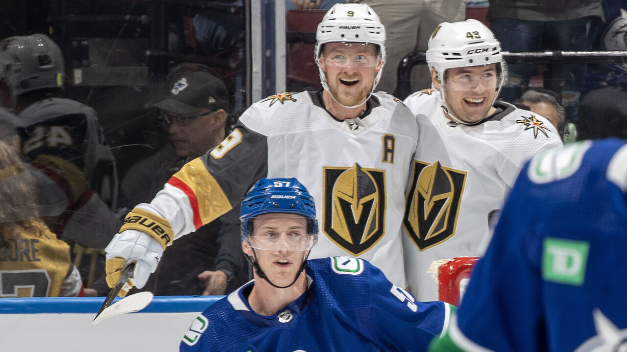 VANCOUVER, CANADA - NOVEMBER 30: Jack Eichel #9 of the Vegas Golden Knights celebrates his goal Paul Cotter #43 while Brock Boeser #6 of the Vancouver Canucks looks on dejected during the first period of their NHL game at Rogers Arena on November 30, 2023 in Vancouver, British Columbia, Canada.