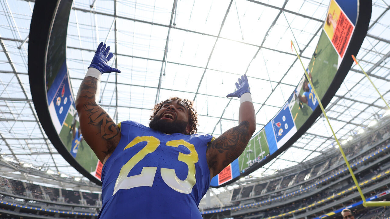 INGLEWOOD, CALIFORNIA - OCTOBER 15: Kyren Williams #23 of the Los Angeles Rams reacts towards fans before the game against the Arizona Cardinals at SoFi Stadium on October 15, 2023 in Inglewood, California.