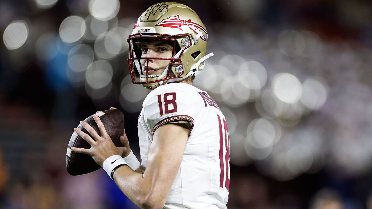 GAINESVILLE, FLORIDA - NOVEMBER 25: Tate Rodemaker #18 of the Florida State Seminoles warms up before the start of a game against the Florida Gators at Ben Hill Griffin Stadium on November 25, 2023 in Gainesville, Florida.