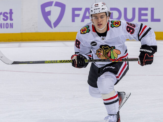 DETROIT, MI - NOVEMBER 30: Connor Bedard #98 of the Chicago Blackhawks skates up ice against the Detroit Red Wings during the first period at Little Caesars Arena on November 30, 2023 in Detroit, Michigan. Detroit defeated Chicago 5-1.