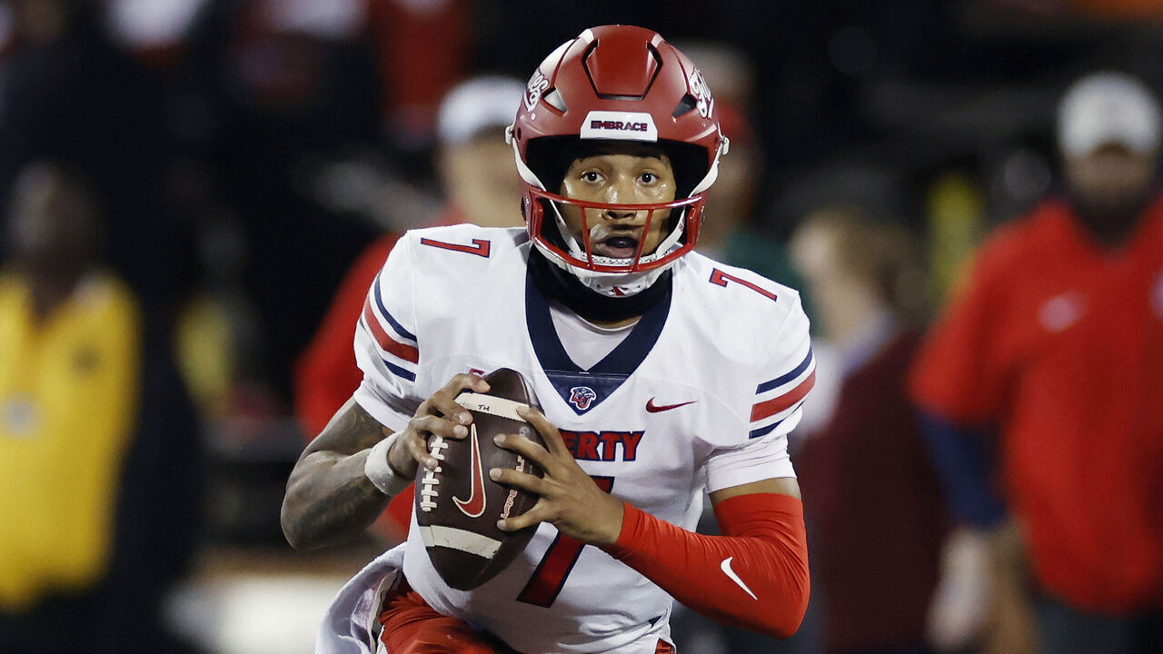 BOWLING GREEN, KY - OCTOBER 24: Liberty Flames quarterback Kaidon Salter (7) looks to pass during a college football game against the Western Kentucky Hilltoppers on October 24, 2023 at Houchens Industries - L. T. Smith Stadium in Bowling Green, Kentucky.