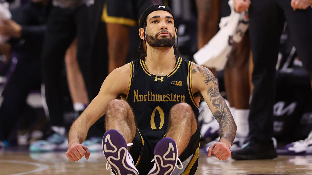 EVANSTON, ILLINOIS - DECEMBER 01: Boo Buie #0 of the Northwestern Wildcats celebrates a basket against the Purdue Boilermakers during the second half at Welsh-Ryan Arena on December 01, 2023 in Evanston, Illinois.