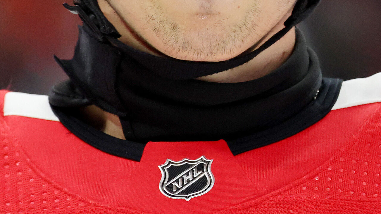 CHICAGO, ILLINOIS - NOVEMBER 05: A detail of a neck guard worn by Wyatt Kaiser #44 of the Chicago Blackhawks during the second period against the New Jersey Devils at the United Center on November 05, 2023 in Chicago, Illinois.