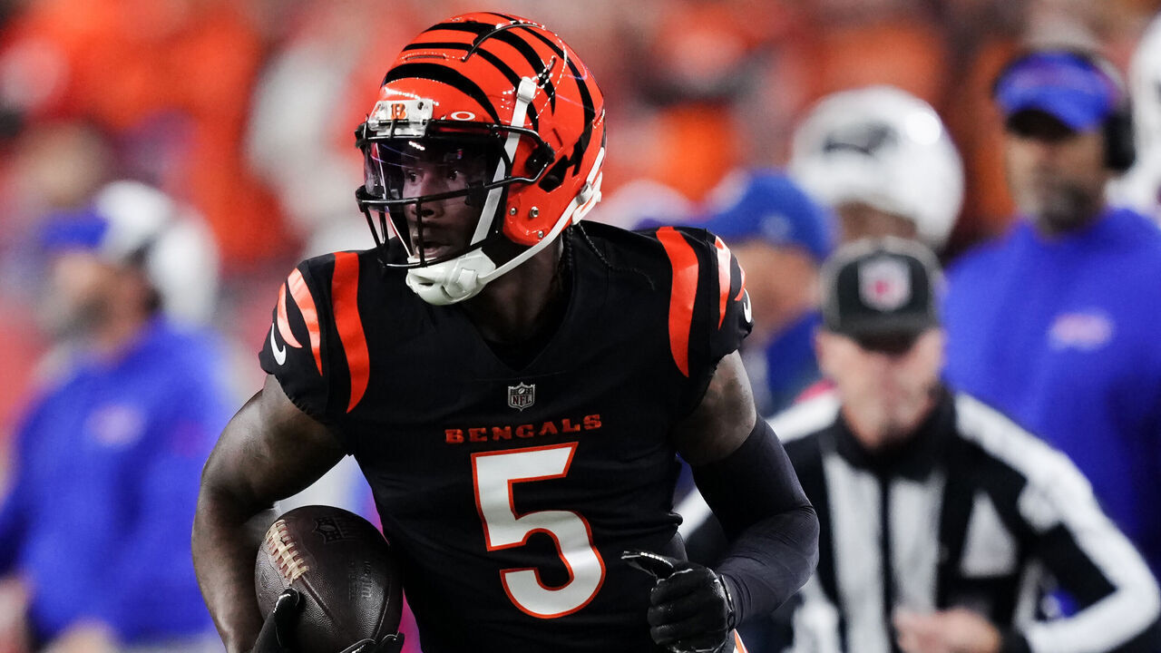 CINCINNATI, OHIO - NOVEMBER 05: Tee Higgins #5 of the Cincinnati Bengals runs with the ball in the first quarter against the Buffalo Bills at Paycor Stadium on November 05, 2023 in Cincinnati, Ohio.