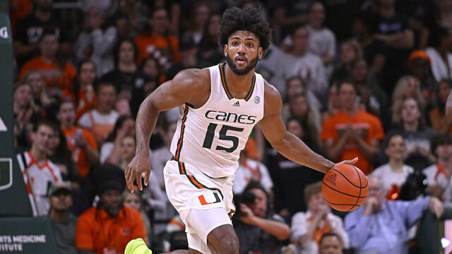 CORAL GABLES, FL - NOVEMBER 13: Miami forward Norchad Omier (15) handles the ball in the first half as the Miami Hurricanes faced the FIU Panthers on November 13, 2023, at the Watsco Center in Coral Gables, Florida.