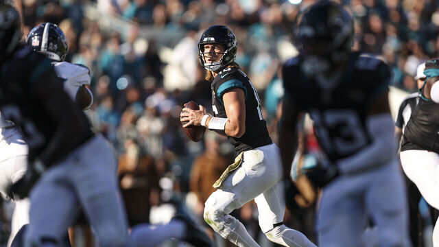 JACKSONVILLE, FL - NOVEMBER 19: Trevor Lawrence #16 of the Jacksonville Jaguars drops back to pass during an NFL football game against the Tennessee Titans at EverBank Stadium on November 19, 2023 in Jacksonville, Florida.