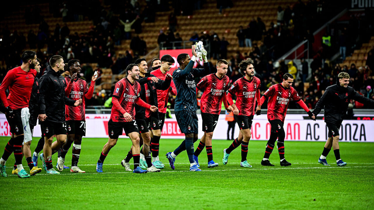 AC Milan's players players celebrate their victory at the end of the Serie A football match between AC Milan and Frosinone at San Siro stadium in Milan, on December 2, 2023.