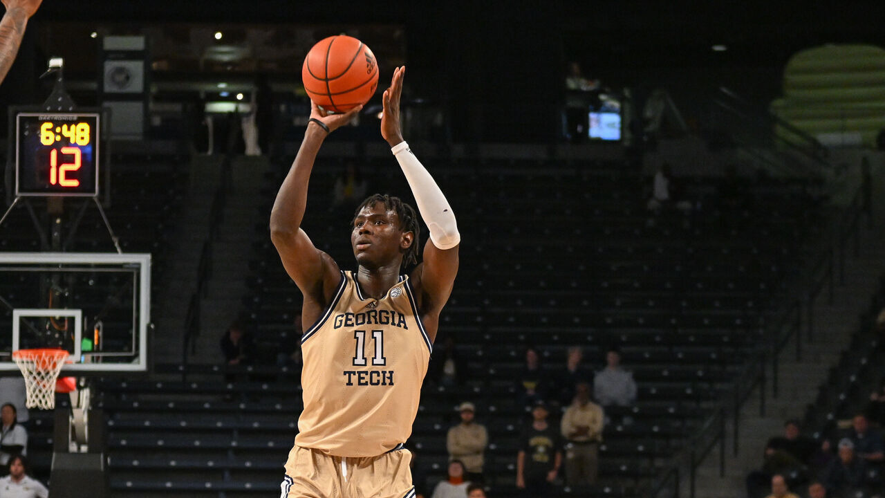 ATLANTA, GA NOVEMBER 28: Georgia Tech forward Baye Ndongo (11) shoots a three-pointer during the college basketball game between the Mississippi State Bulldogs and the Georgia Tech Yellow Jackets on November 28th, 2023 at Hank McCamish Pavilion in Atlanta, GA.