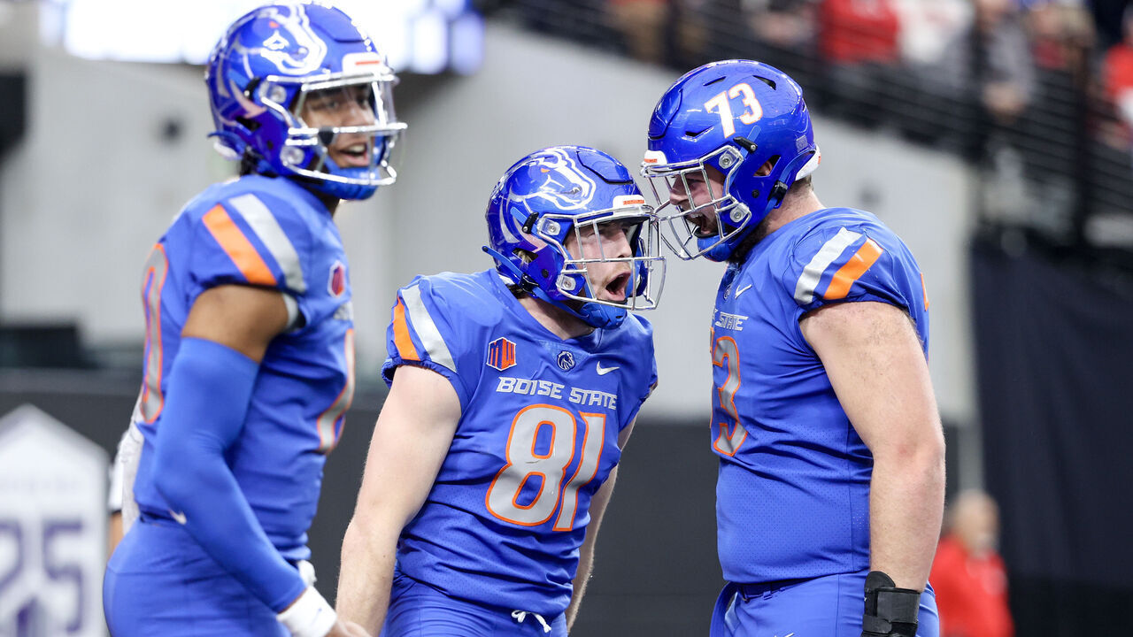 LAS VEGAS, NEVADA - DECEMBER 02: Taylen Green #10 of the Boise State Broncos, Austin Bolt #81 of the Boise State Broncos, and Ethan Carde #73 of the Boise State Broncos celebrate after Bolt's receiving touchdown during the second quarter against the UNLV Rebels during the Mountain West Football Championship at Allegiant Stadium on December 02, 2023 in Las Vegas, Nevada.