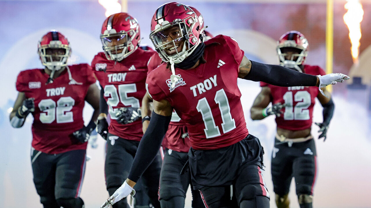 TROY, ALABAMA - NOVEMBER 2: O'shai Fletcher #11 of the Troy Trojans takes the field prior to kickoff against the South Alabama Jaguars at Veterans Memorial Stadium on November 2, 2023 in Troy, Alabama.