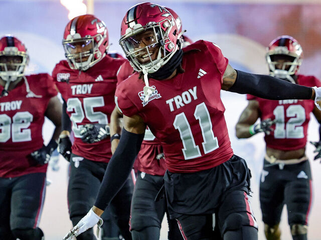 TROY, ALABAMA - NOVEMBER 2: O'shai Fletcher #11 of the Troy Trojans takes the field prior to kickoff against the South Alabama Jaguars at Veterans Memorial Stadium on November 2, 2023 in Troy, Alabama.