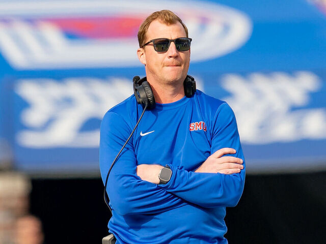 DALLAS, TX - NOVEMBER 25: Southern Methodist Mustangs head coach Rhett Lashlee watches a play during a college football game between the Navy Midshipmen and Southern Methodist Mustangs on November 25, 2023 at Gerald Ford Stadium in Dallas, TX.