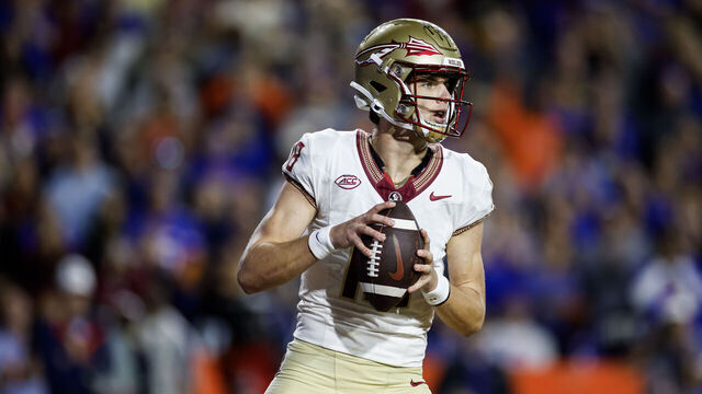 GAINESVILLE, FLORIDA - NOVEMBER 25: Tate Rodemaker #18 of the Florida State Seminoles looks to pass during the first half of a game against the Florida Gators at Ben Hill Griffin Stadium on November 25, 2023 in Gainesville, Florida.