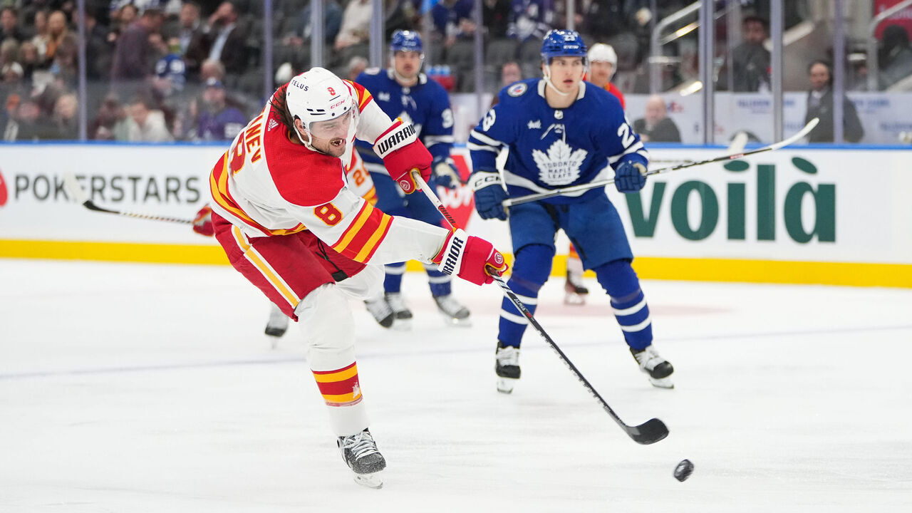 TORONTO, CANADA - NOVEMBER 10: Chris Tanev #8 of the Calgary Flames takes a shot against the Toronto Maple Leafs at Scotiabank Arena on November 10, 2023 in Toronto, Ontario, Canada.