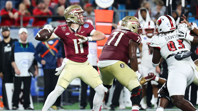 CHARLOTTE, NORTH CAROLINA - DECEMBER 2: Brock Glenn #11 of the Florida State Seminoles throws the ball against the Louisville Cardinals during the first half during the ACC Championship at Bank of America Stadium on December 2, 2023 in Charlotte, North Carolina.