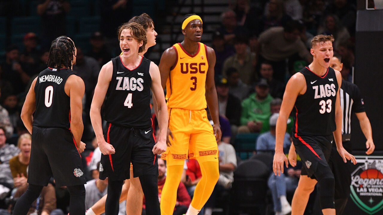 LAS VEGAS, NV - DECEMBER 02: Gonzaga Bulldogs guard Dusty Stromer (4) celebrates with Gonzaga Bulldogs guard Ryan Nembhard (0) and Gonzaga Bulldogs forward Ben Gregg (33) during the Legends of Basketball Las Vegas Invitational between Gonzaga Bulldogs vs USC Trojans on December 2, 2023 at MGM Grand Arena in Las Vegas, NV.