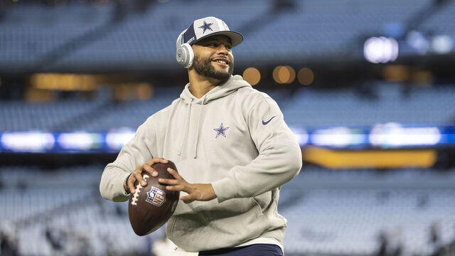 ARLINGTON, TEXAS - NOVEMBER 30: Dak Prescott #4 of the Dallas Cowboys looks to throw a pass as he warms up prior to an NFL football game between the Dallas Cowboys and the Seattle Seahawks at AT&T Stadium on November 30, 2023 in Arlington, Texas.