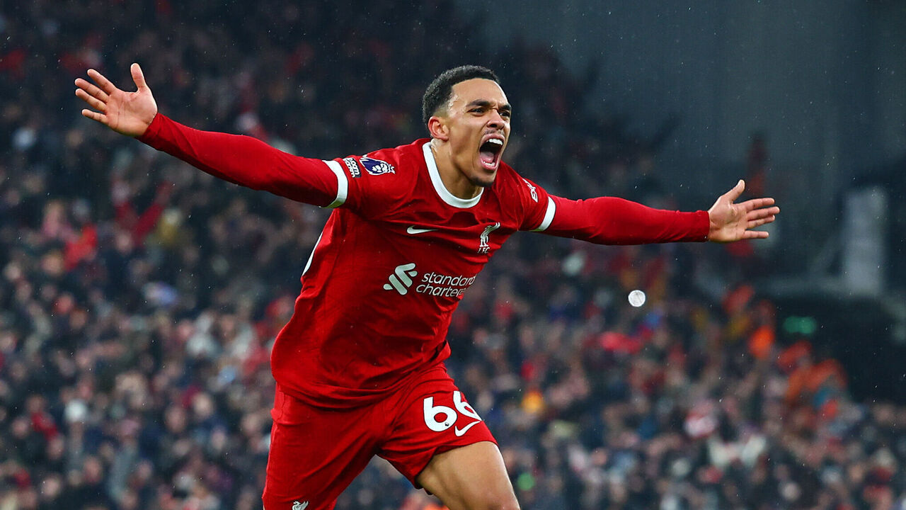 LIVERPOOL, ENGLAND - DECEMBER 03: Trent Alexander-Arnold of Liverpool celebrates scoring his side's fourth goa during the Premier League match between Liverpool FC and Fulham FC at Anfield on December 03, 2023 in Liverpool, England.