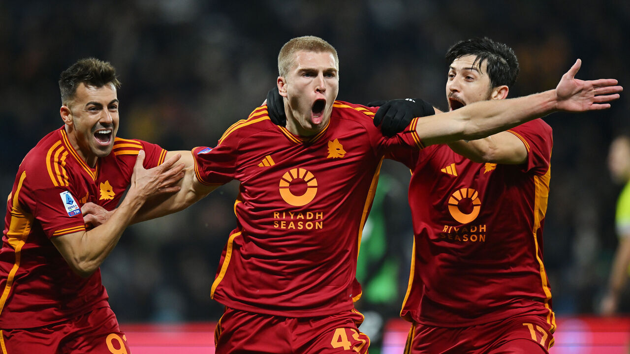 REGGIO NELL'EMILIA, ITALY - DECEMBER 03: Rasmus Kristensen of AS Roma celebrates with teammates Stephan El Shaarawy (L) and Sardar Azmoun after scoring the team's second goal during the Serie A TIM match between US Sassuolo and AS Roma at Mapei Stadium - Citta' del Tricolore on December 03, 2023 in Reggio nell'Emilia, Italy.