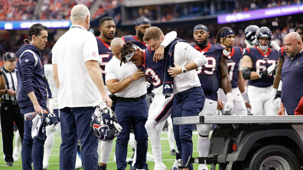 HOUSTON, TEXAS - DECEMBER 03: Tank Dell #3 of the Houston Texans is carted off the field after being injured in the first quarter against the Denver Broncos at NRG Stadium on December 03, 2023 in Houston, Texas.