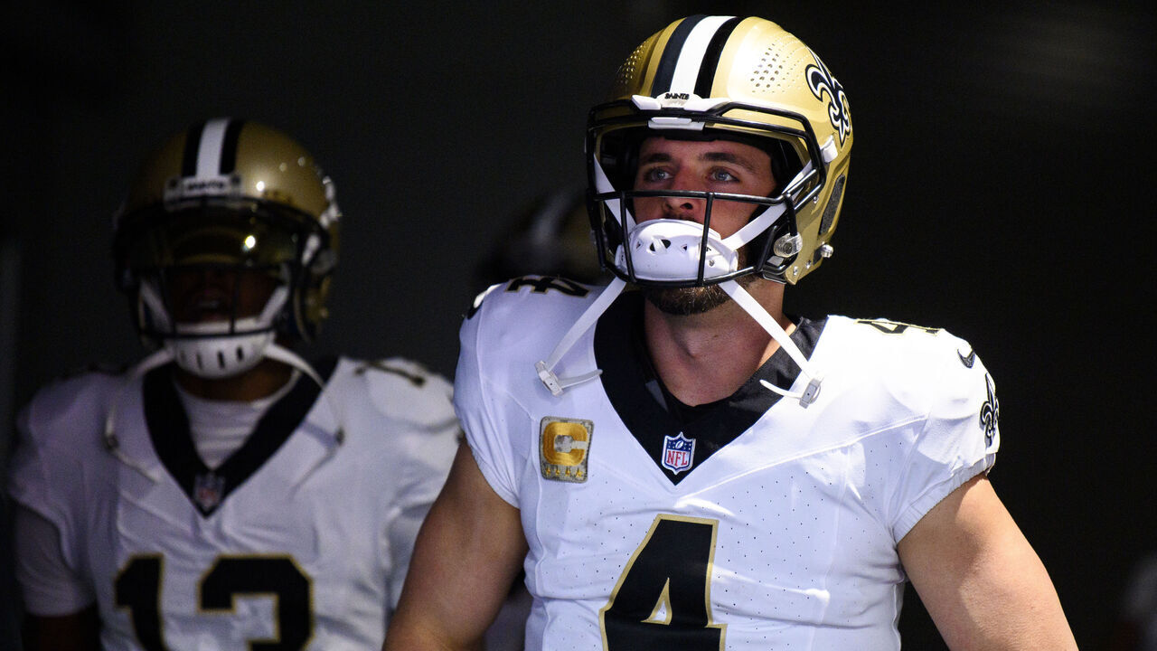 MINNEAPOLIS, MINNESOTA - NOVEMBER 12: Derek Carr #4 of the New Orleans Saints walks through the tunnel before the game against the Minnesota Vikings at U.S. Bank Stadium on November 12, 2023 in Minneapolis, Minnesota.