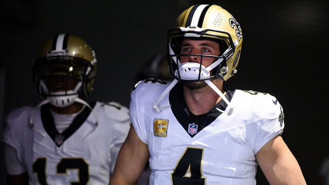 MINNEAPOLIS, MINNESOTA - NOVEMBER 12: Derek Carr #4 of the New Orleans Saints walks through the tunnel before the game against the Minnesota Vikings at U.S. Bank Stadium on November 12, 2023 in Minneapolis, Minnesota.