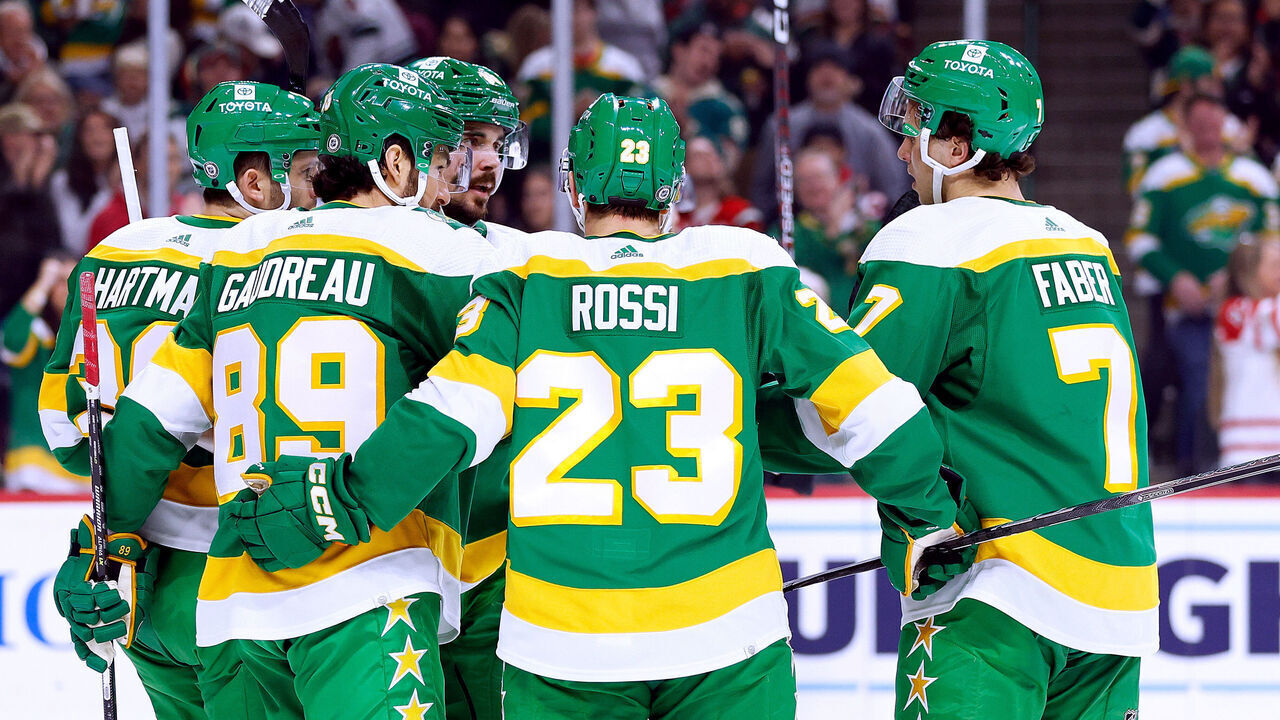 ST PAUL, MINNESOTA - DECEMBER 03: Marco Rossi #23 of the Minnesota Wild celebrates his goal against the Chicago Blackhawks with teammates in the first period at Xcel Energy Center on December 03, 2023 in St Paul, Minnesota.