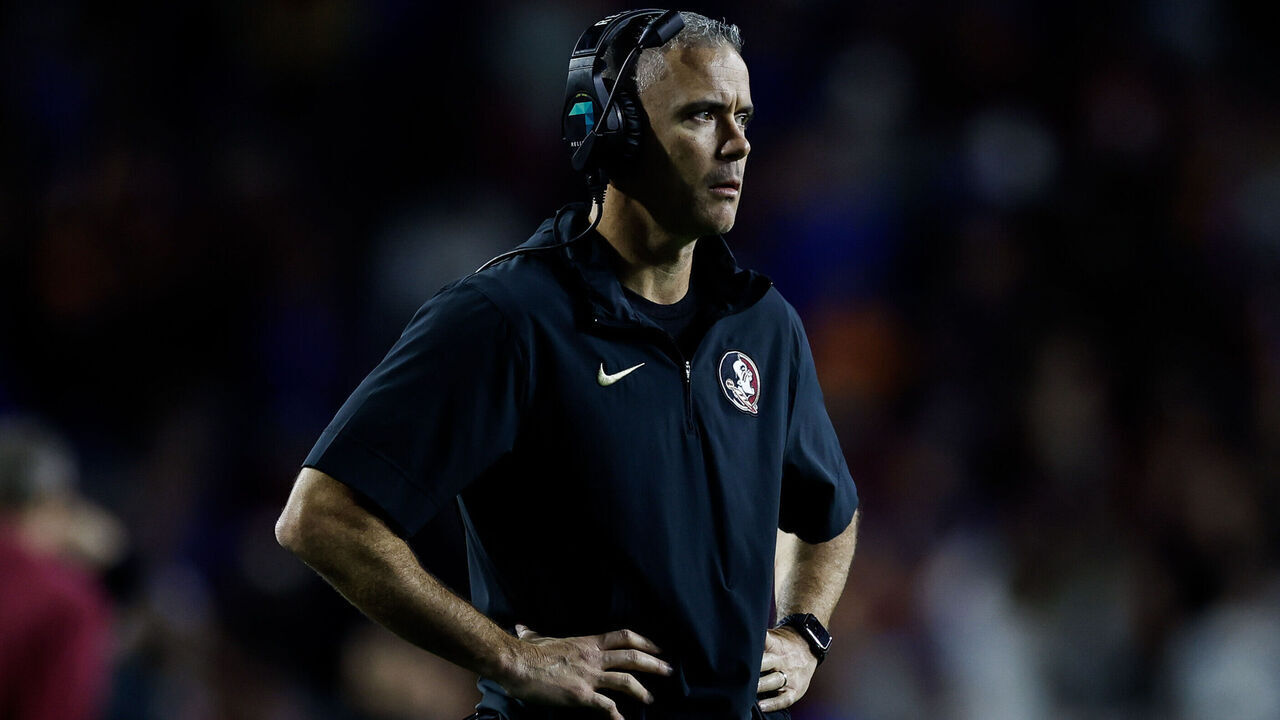 GAINESVILLE, FLORIDA - NOVEMBER 25: Head coach Mike Norvell of the Florida State Seminoles looks on during the second half of a game against the Florida Gators at Ben Hill Griffin Stadium on November 25, 2023 in Gainesville, Florida.