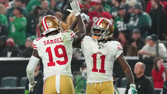 PHILADELPHIA, PENNSYLVANIA - DECEMBER 03: Deebo Samuel #19 of the San Francisco 49ers celebrates after a touchdown with Brandon Aiyuk #11 during the third quarter in the game against the Philadelphia Eagles at Lincoln Financial Field on December 03, 2023 in Philadelphia, Pennsylvania.
